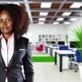 DALL·E 2024-07-11 08.51.52 - A professional African woman in her 30s with curly hair, wearing a smart business suit, standing confidently in a modern office setting. The backgroun DALL·E 2024-07-11 08.51.52 - A professional African woman in her 30s with curly hair, wearing a smart business suit, standing confidently in a modern office setting. The backgroun